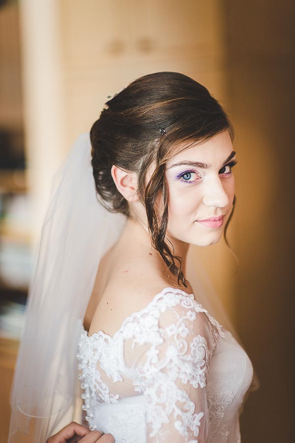 bride in lace wedding dresses
